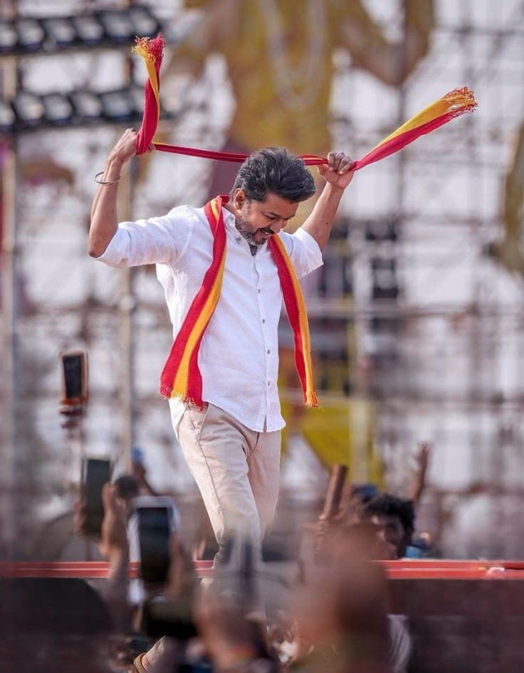 Leader greeting crowd